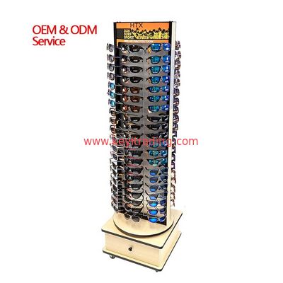 Soporte de exhibición giratorio de madera de doble cara para gafas de sol con cajón de almacenamiento