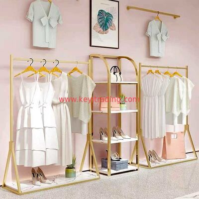 Estante de exhibición personalizado de ropa dorada para tienda minorista para vestido de camiseta