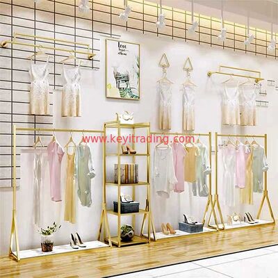 Estante de exhibición personalizado de ropa dorada para tienda minorista para vestido de camiseta